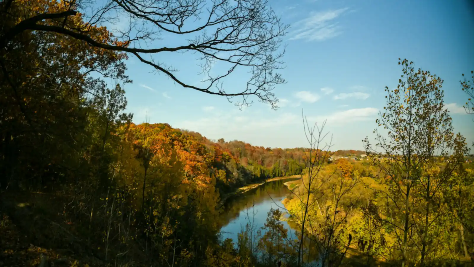 The Grand River winding through autumn trees near Kitchener